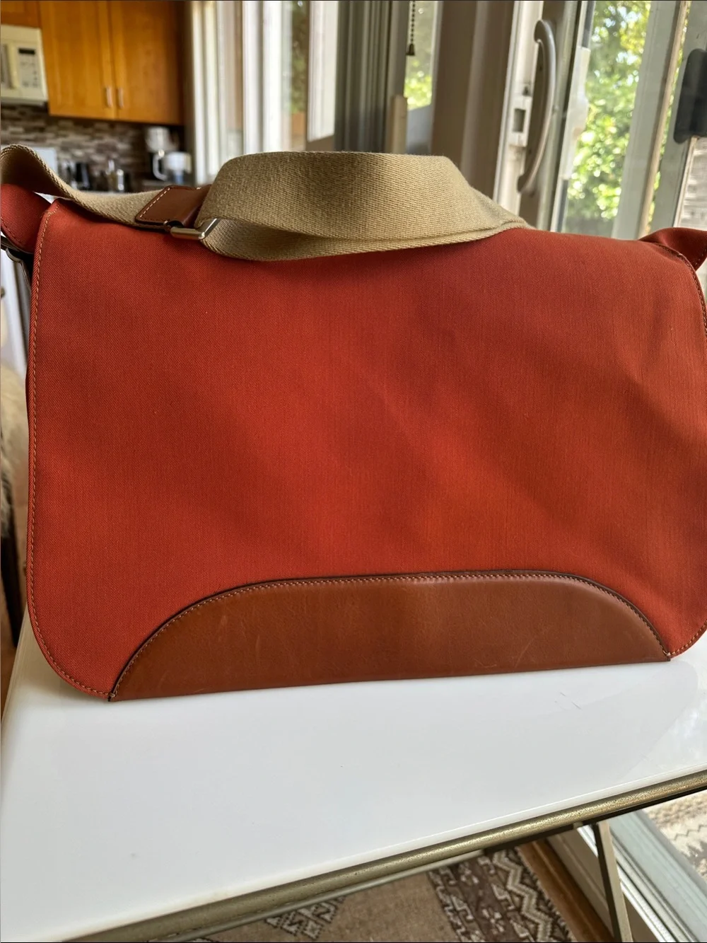 Trafalgar men’s messenger bag burnt orange with leather trim! Live New